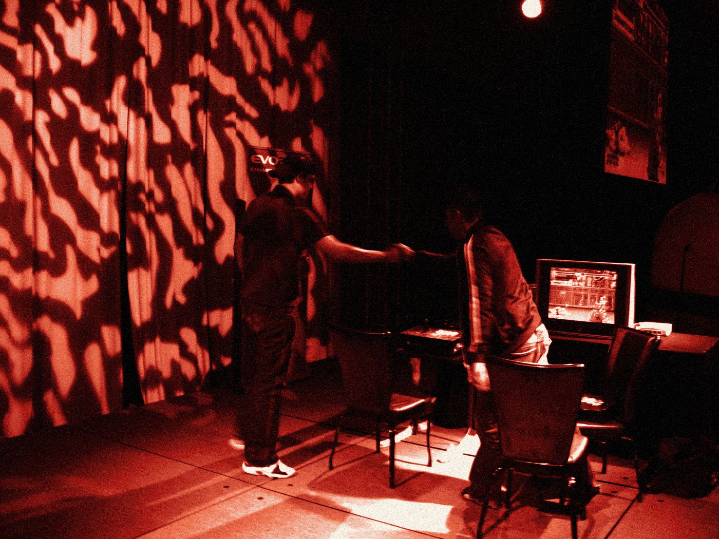 A handshake on stage after a match